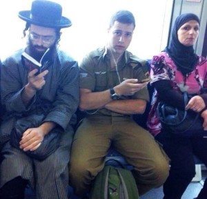 Israeli-Soldier-Arab-Woman-and-hasidic-jew-setting-next-to-each-other-in-a-train-800x768